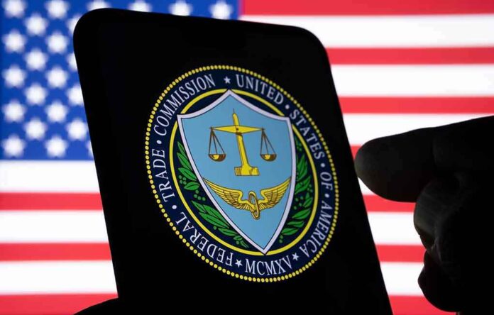 1999129859 featured image FTC logo on smartphone with American flag background.