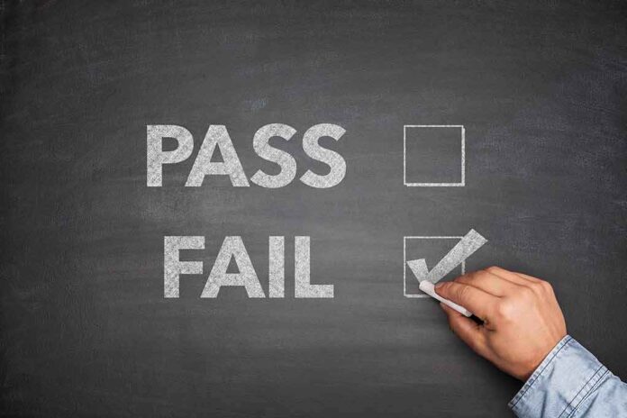 212929645 featured image "Pass and Fail options with Fail checked on chalkboard."
