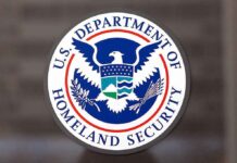 U.S. Department of Homeland Security logo on dark background.