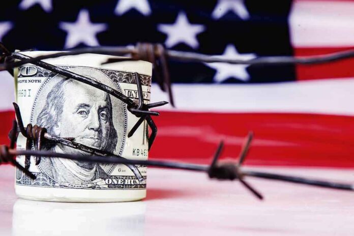 1828091912 featured image Money behind barbed wire