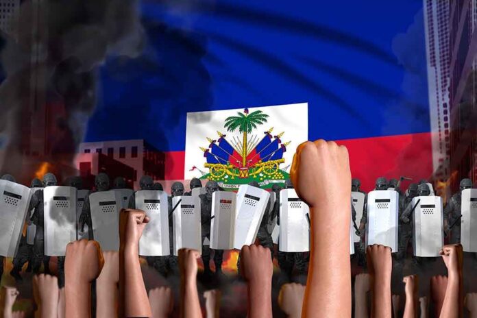 1840143631 featured image Raised fists and riot police under Haitian flag