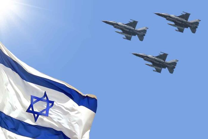 1965607009 featured image Israeli flag with three fighter jets flying overhead.