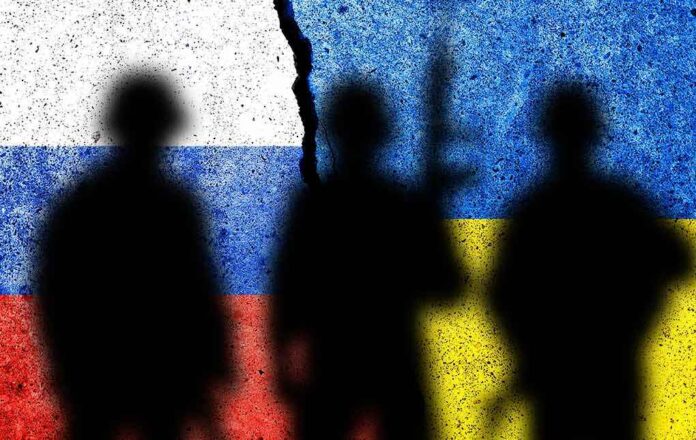 2095910923 featured image Silhouettes with Russian and Ukrainian flags background split