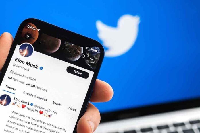2150043711 featured image Hand holding phone displaying Twitter profile