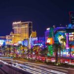 Las Vegas Strip at night with bright neon lights.