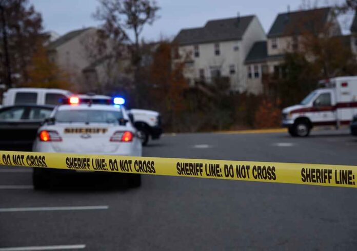 1230120340 featured image Sheriff line tape blocking scene with police