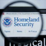 Magnifying glass showing Homeland Security website