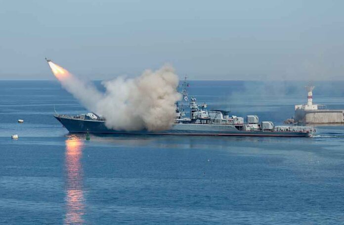 533229181 featured image Warship firing missile in the sea