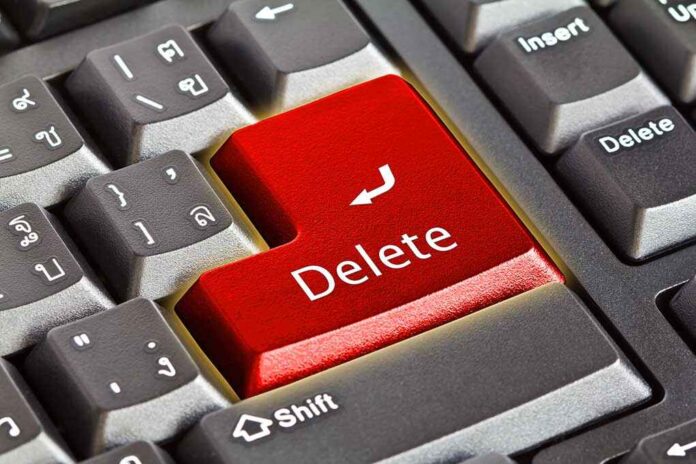 77868673 featured image Closeup of a keyboard with red Delete key
