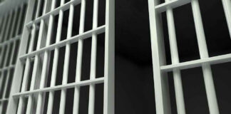 close up of prison bars