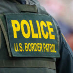 Police us Border Patrol uniform close up