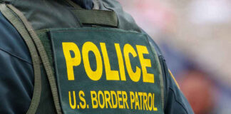 Police us Border Patrol uniform close up