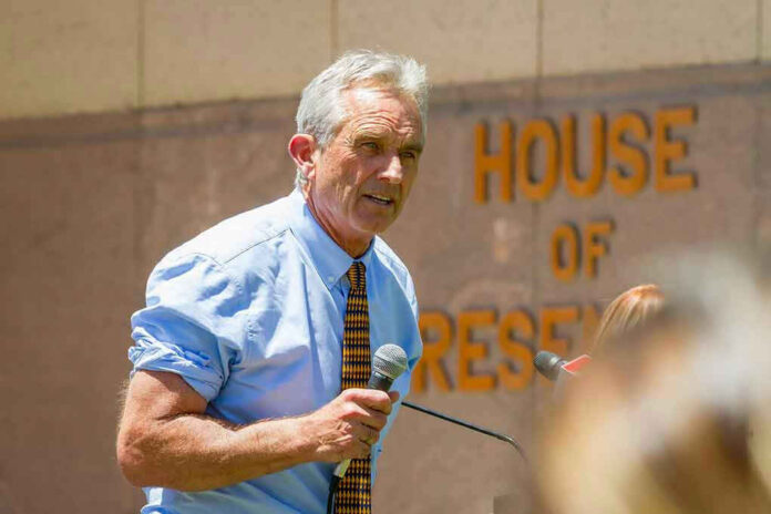 1401970814 Man speaking into microphone outside House of Representatives