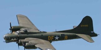 Boeing B17 flying against a clear blue sky