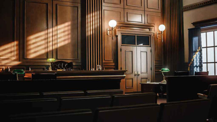 Empty courtroom with judges bench and wooden decor