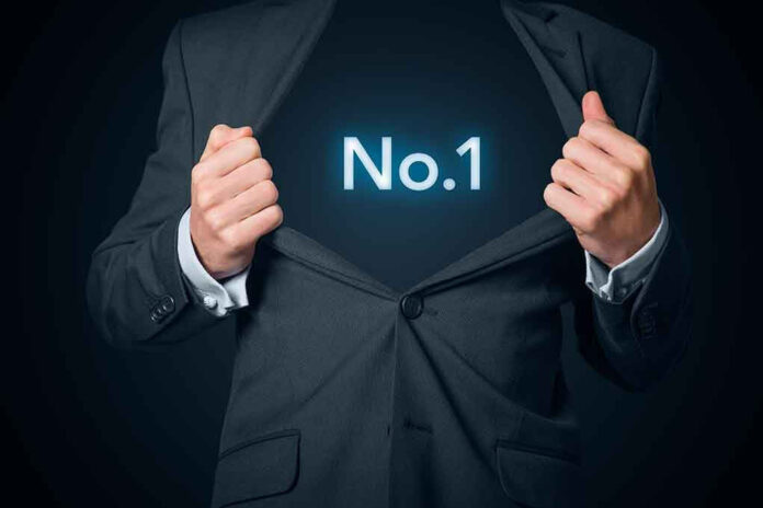 350473196 Man opening suit to reveal glowing number one