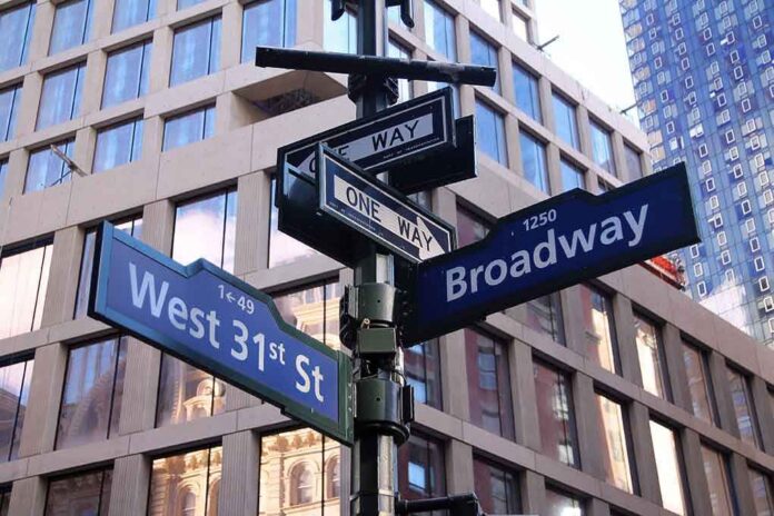 Street signs at the intersection of Broadway and West 31st Street