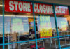 Store closing sale with going out of business signs.
