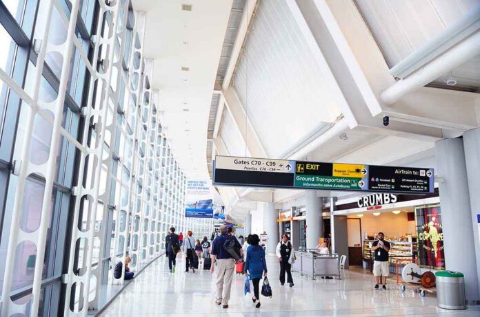 Newark,,Nj,-,Oct,5:,Newark,Airport,Interior,On,October Interior of an airport terminal with travelers and signage