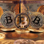 Bitcoin coins and bills displayed closely.