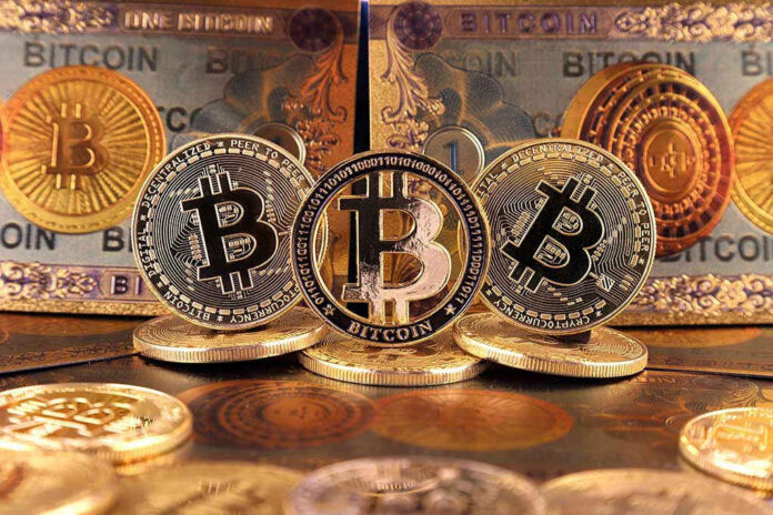 Bitcoin coins and bills displayed closely.