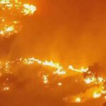 Firefighters battle one of Spain's biggest-ever wildfires