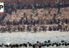 Visa Showdown: Italy Slams Door on Neighbors Thousands of migrants swim around the border from Morocco into Ceuta, Spain