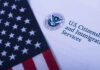 American flag beside U.S. immigration document