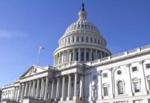 Doctor Can’t Answer Simple Question During Congressional Hearing The U.S. Capitol building with a clear blue sky in the background