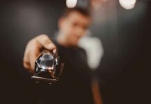 Hair clipper held toward the camera