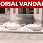 WWII Memorial fountain overflows with bubbles, vandalized with paint