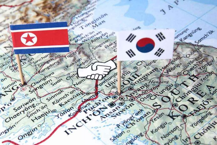 Map of Korean Peninsula with North and South Korean flags and handshake icon