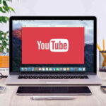 El Chapo LISTS 32 U.S Government Officials Involved in Corruption! YouTube logo on a laptop screen on desk.