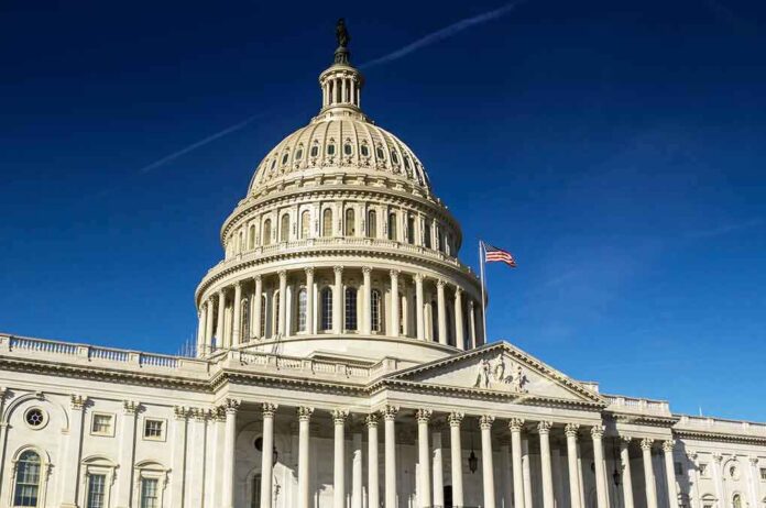 shutterstock_1037723068 United States Capitol dome against clear blue sky