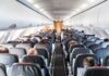 Airplane Cabin CHAOS, Roof Collapses Mid-Flight Airplane cabin with passengers seated in rows