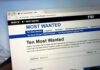Computer screen showing an FBI Most Wanted webpage