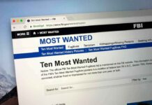 Computer screen showing an FBI Most Wanted webpage