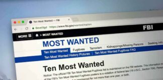 Computer screen showing an FBI Most Wanted webpage
