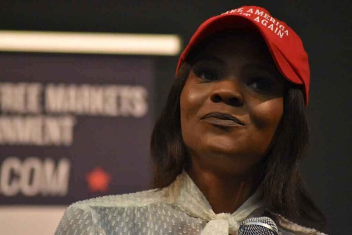 shutterstock_1232508256 woman in a red cap speaking into a microphone