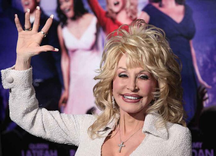 shutterstock_127451906 blonde woman waving at a red carpet event