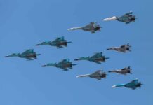 Poland Tells Fighters ‘Shoot Anything That Moves!’ A formation of military jet fighters flying in a clear blue sky