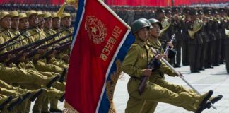 Military parade with soldiers marching; Pham Van Dong, Zhang Jun, Zhang Yufeng, Norichika Aoki, Andreas Hestler, Jonathan Cyprien not visible