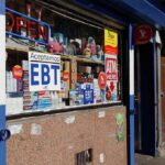 Convenience store window with EBT and ATM signs