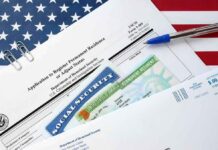 Trumps Quiet Change to Immigration Policy Is a Big Deal immigration forms with green card and social security card on US flag background