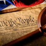 Supreme Court Shocker:Red State’s Redistricting Triumph U.S. Constitution with gavel and flag