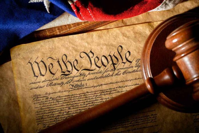 shutterstock_1650343750 U.S. Constitution with gavel and flag
