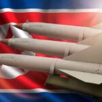 Trump Bets His Kim Friendship Stops Nukes Missiles in front of North Korea flag