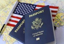 U.S. passports on a map with an American flag