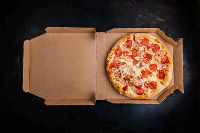 shutterstock_697075222 Pepperoni pizza in an open cardboard box
