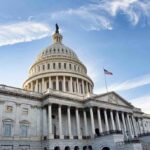Senator’s Chilling Warning to Trump Hires United States Capitol building under a blue sky